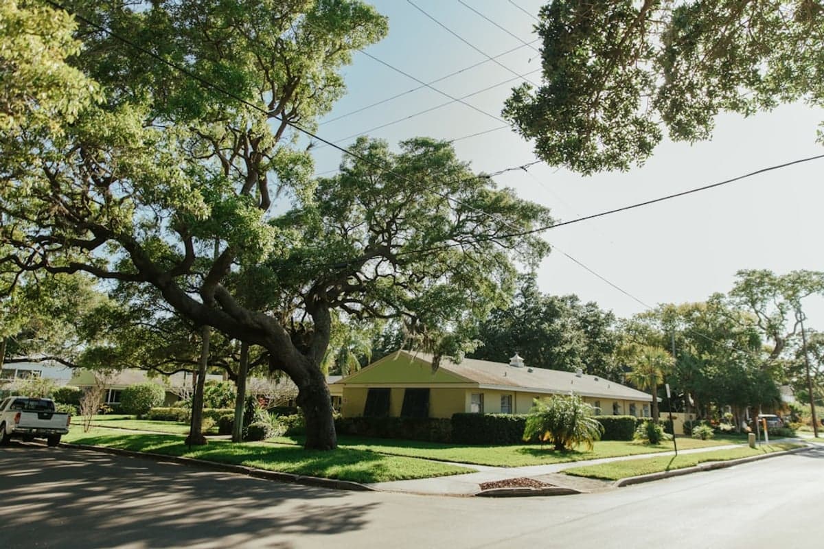 Round Rock - Neighborhood streets and residential character Round Rock subdivision entrance or tree-lined residential street