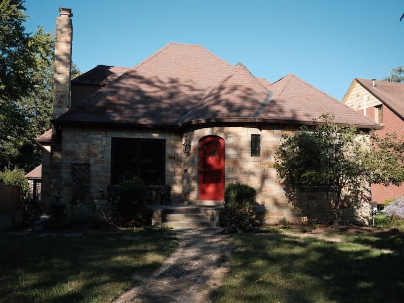 Round Rock - Established Suburb Anchored by Round Rock ISD Single-family home with a large yard and mature trees, suburban street in Round Rock